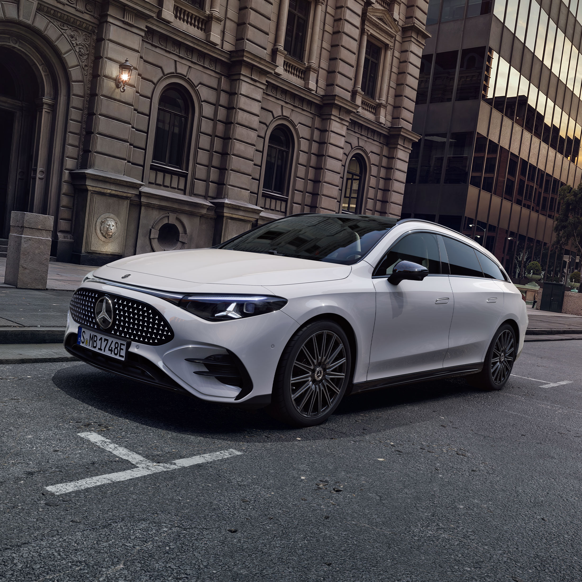 Fron side view of the all-new electric CLA Shooting Brake parked on a city street.